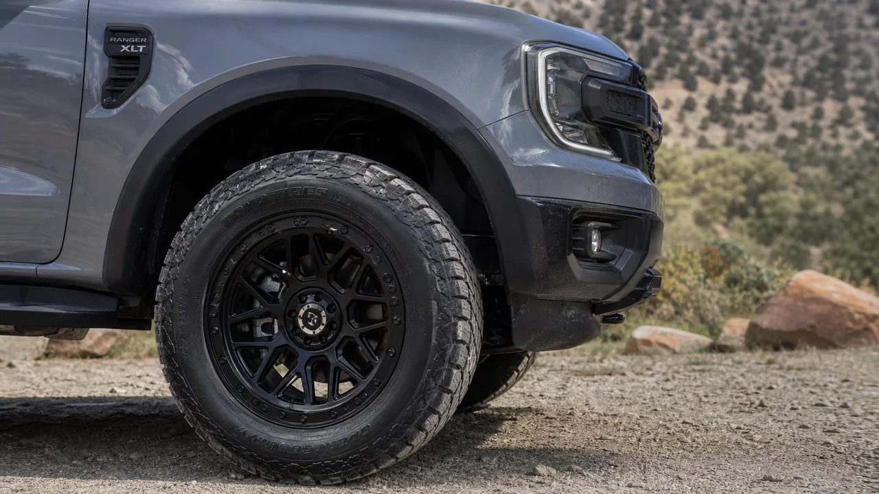 Best Ford Ranger Wheels for a Strong 20x10 Fitment Close up of Ford Ranger 20x10 wheel fitment with realistic tire sidewall