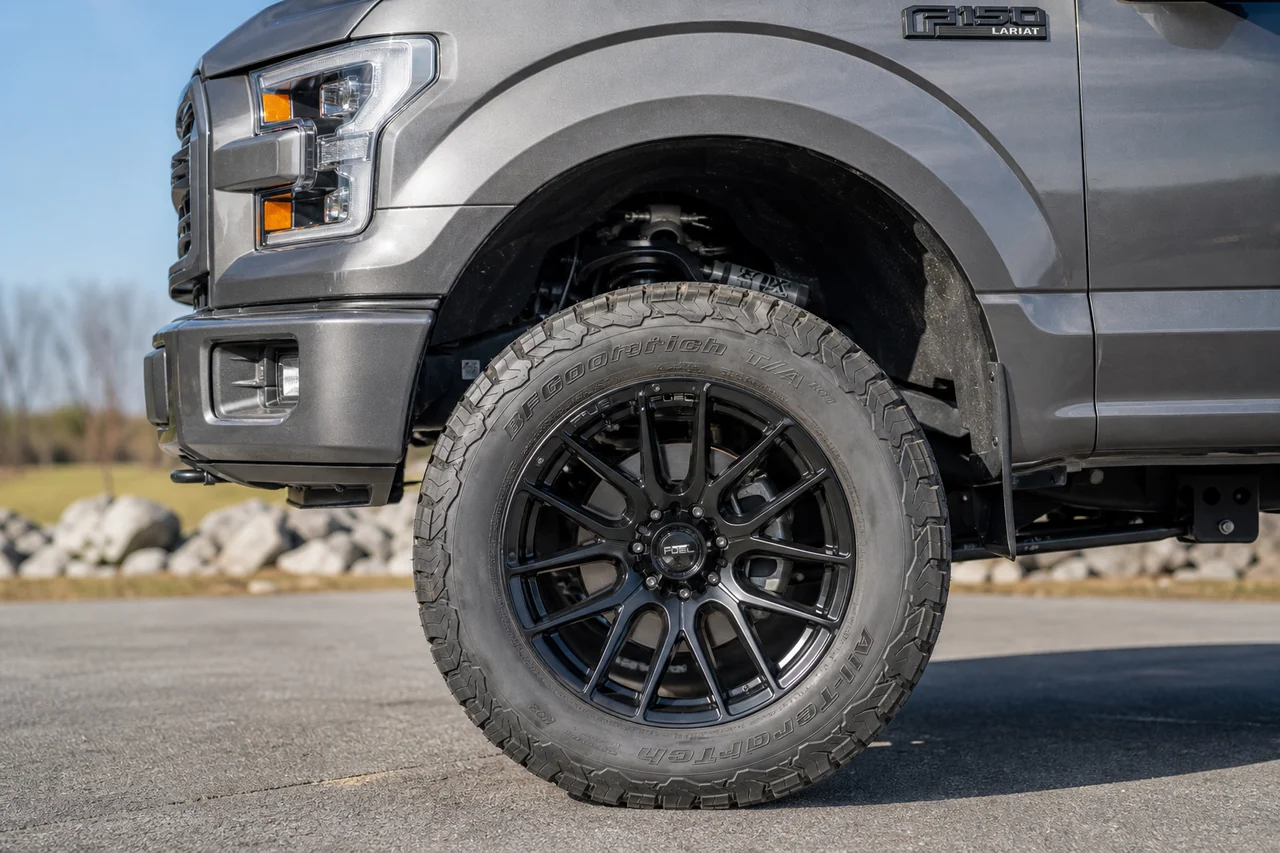 Best Ford F150 Wheels for a Strong Lifted Truck Setup Lifted Ford F150 20x10 wheel close up with 35 inch tire clearance