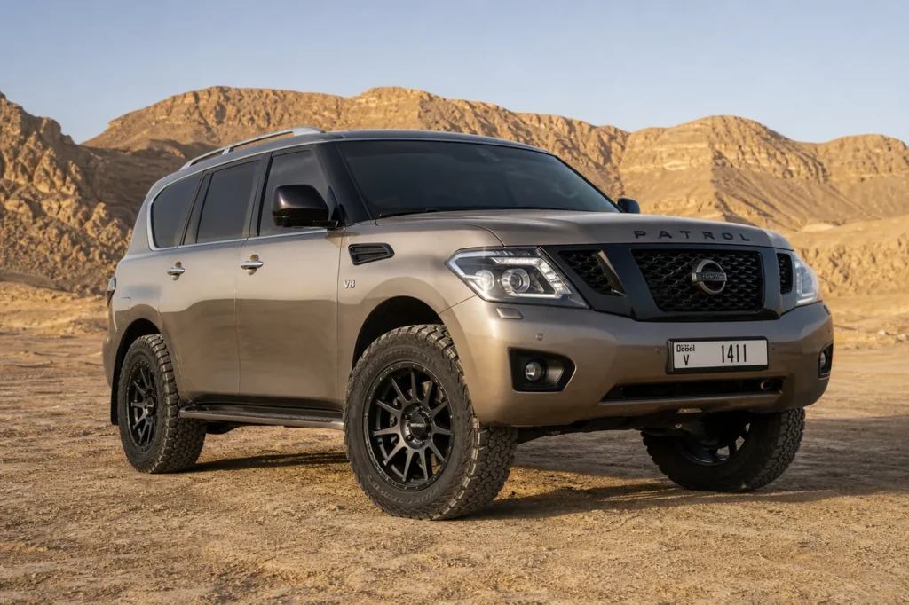 Nissan Patrol Y62 with satin black forged off road wheels in desert light