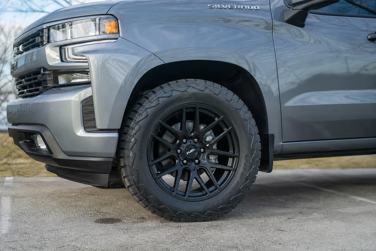 Best Chevrolet Silverado Wheels for a Strong 20 Inch Setup Chevy Silverado 20x10 wheel close up showing tire sidewall and fender clearance